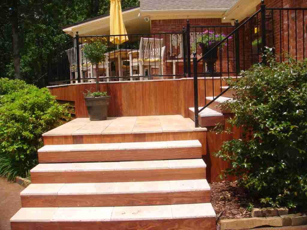 Resurfaced steps with Travertine pavers silca grates
