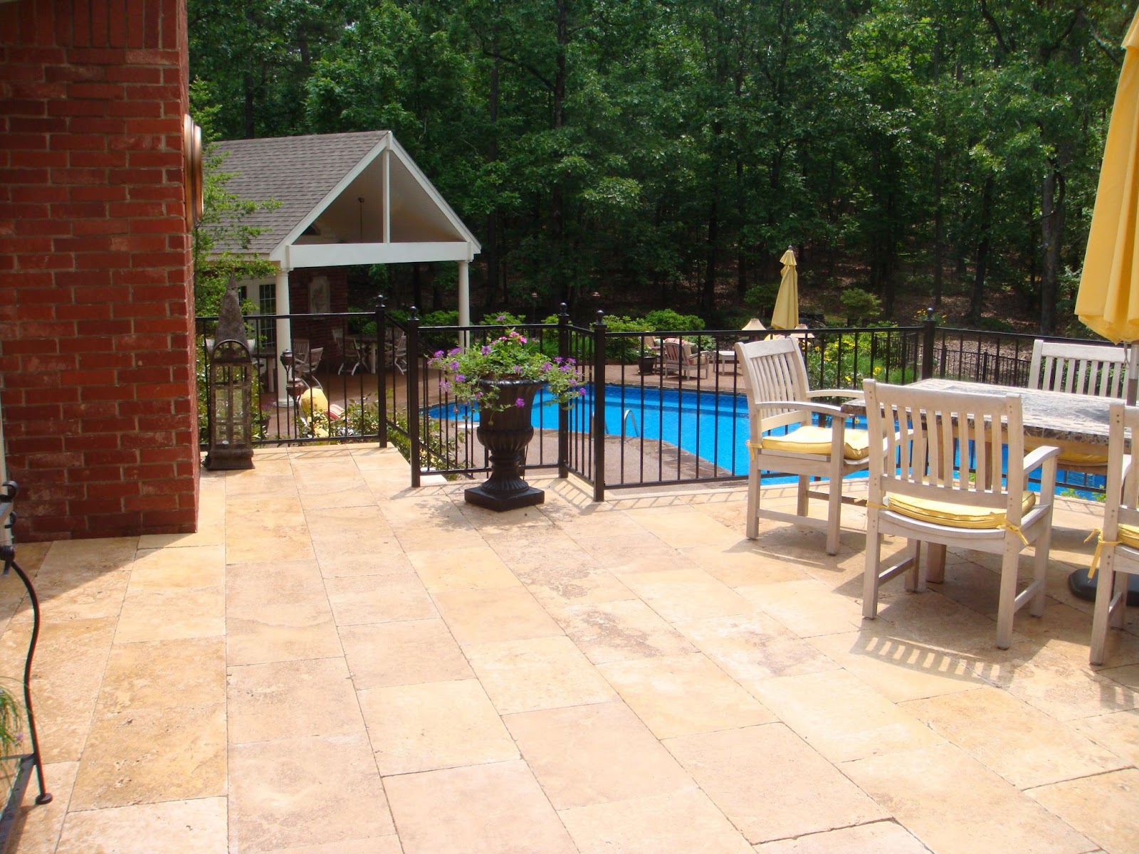 Poolside Deck Travertine 2009 finished project Travertine pavers on an elevated deck overlooking the pool