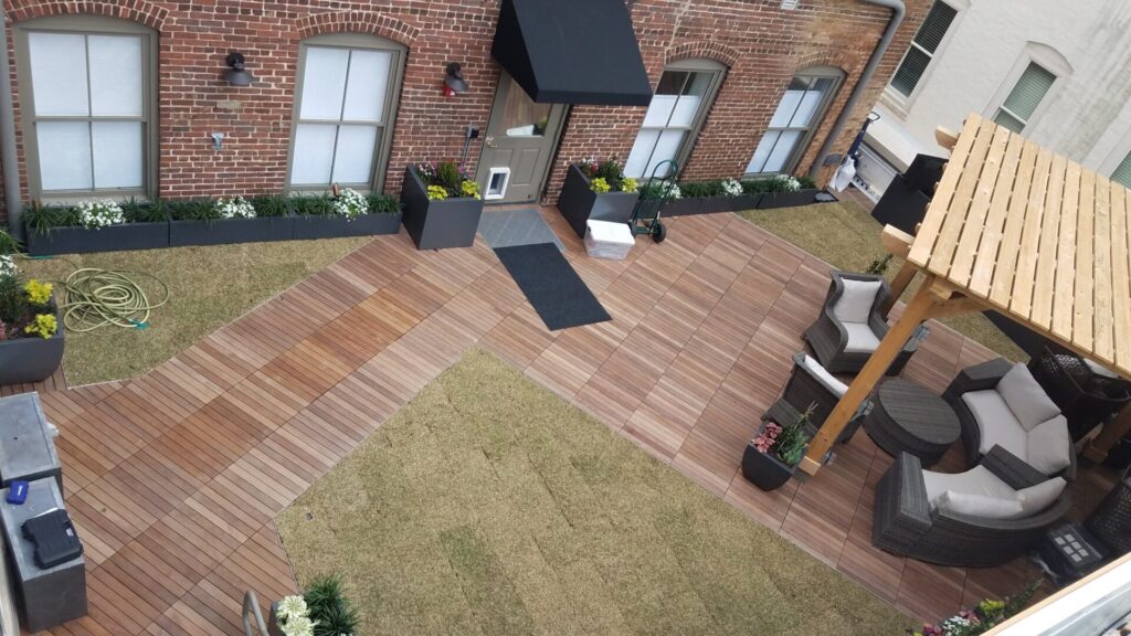 Rooftop deck installation using the Stonedeks system to combine materials for a safe and enjoyable rooftop deck