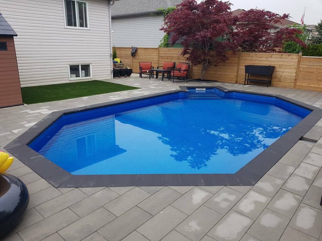 converted above ground pool to stone paver pool deck and terrace.