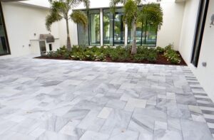 White marble pool deck pavers