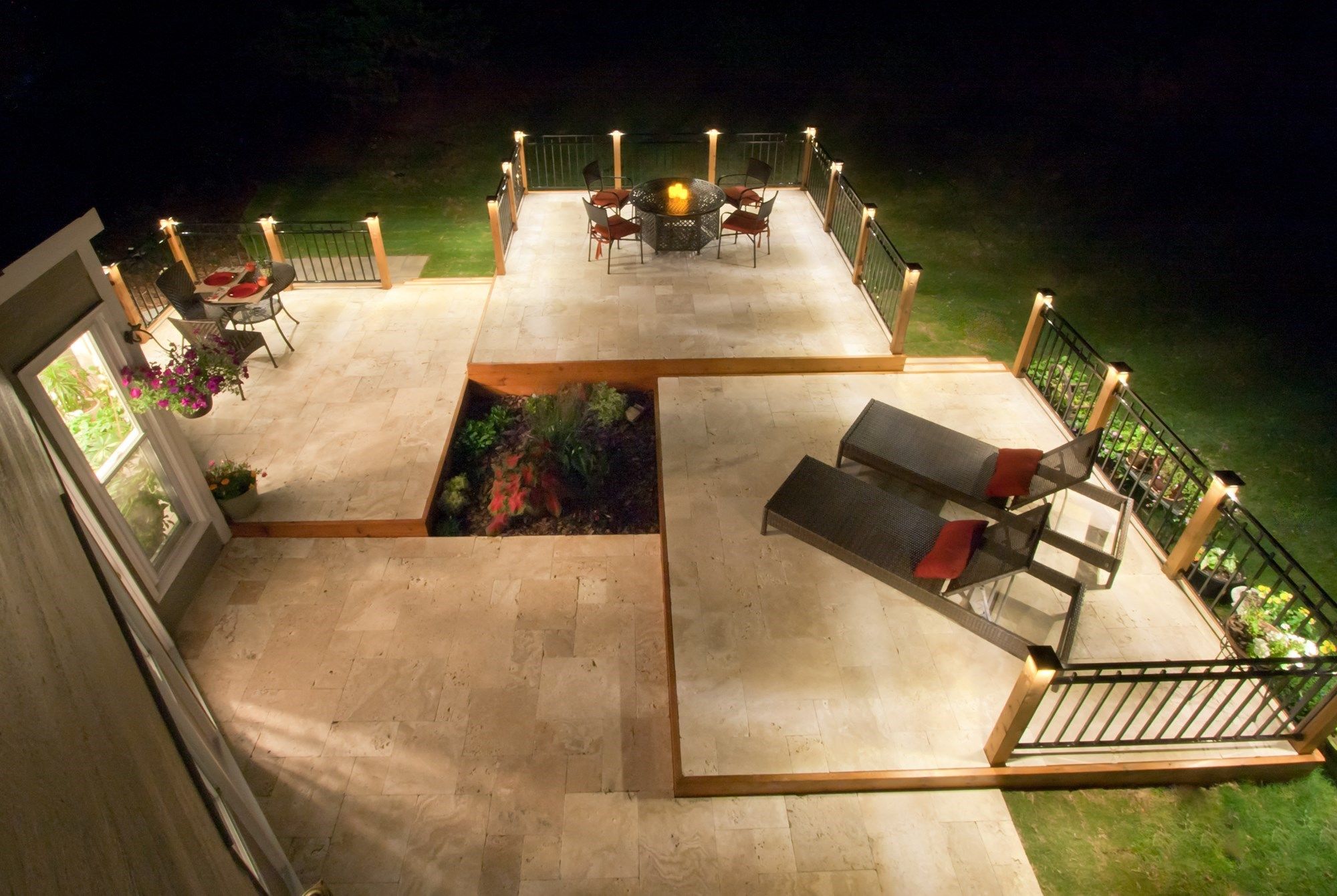 Elevated-Deck-Travertine-Pavers-StoneDeks elevated multi-level deck using Travertine pavers around a built-in firepit
